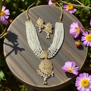 Nimrat, Elegant Gold and White Jadau Jewelry Set